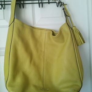 Mustard colored authentic leather Coach